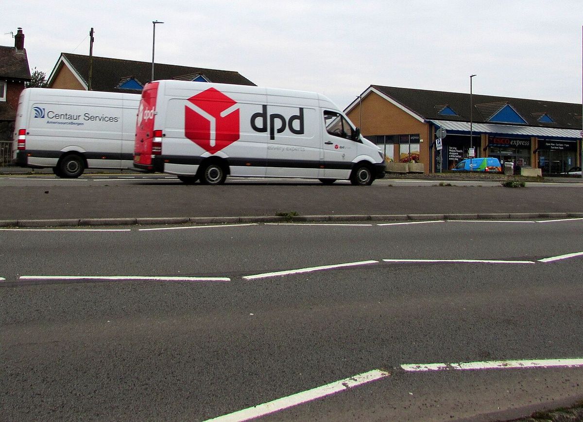 A white DPD delivery van with the red DPD logo