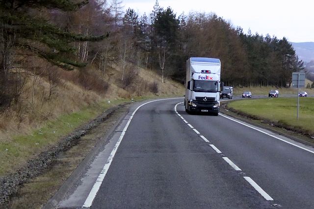 A FedEx delivery van on the A9 road near Blair Atholl in Scotland
